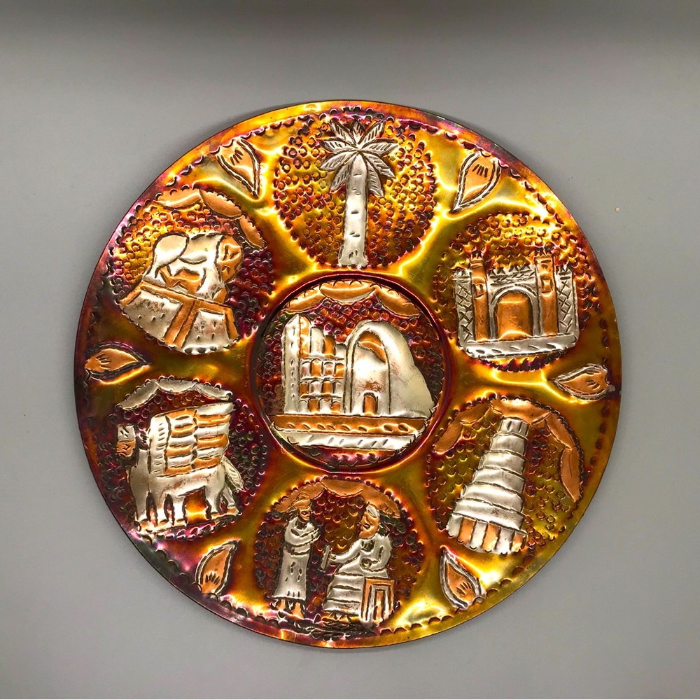 Stunning Persian, metal, repousse plate with images of ancient Persia.